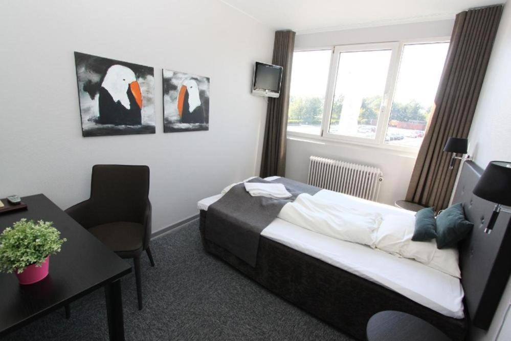 Banegaardshotellet Vojens Екстер'єр фото