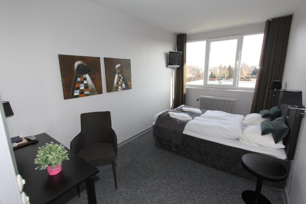 Banegaardshotellet Vojens Екстер'єр фото